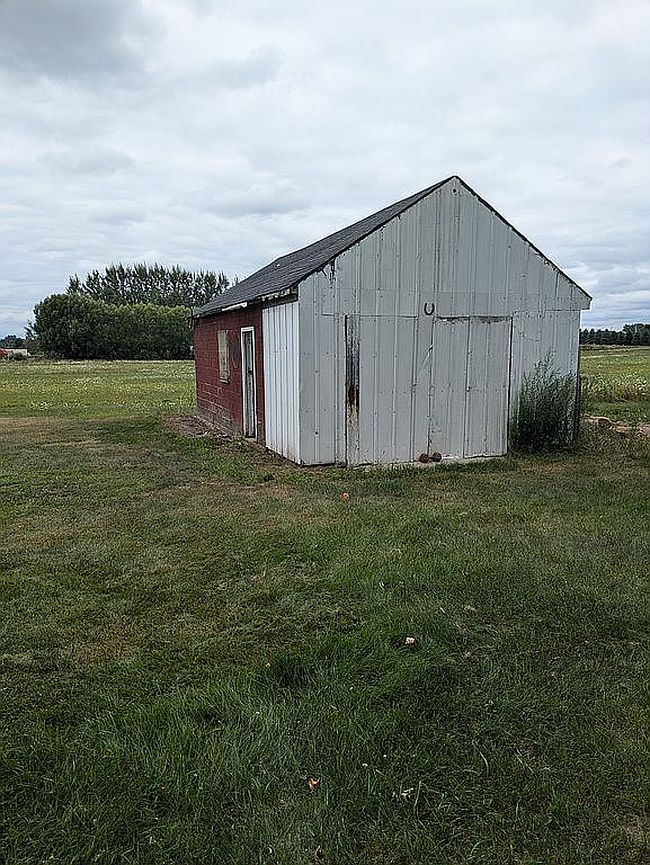 Photo of 6408 Five Mile Rd, Hope, MI