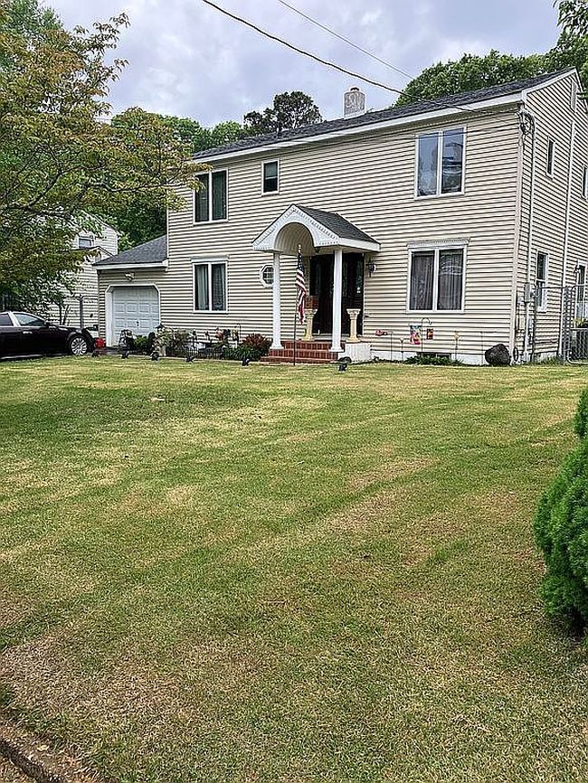 Photo of 11 Jumping Brook Dr, Neptune, NJ