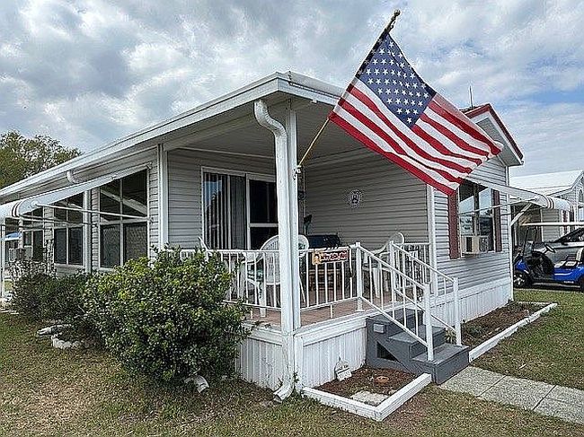 Photo of 12645 Morning Dr Lot 64, Dade City, FL
