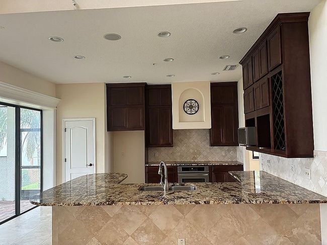 Photo of 635 Waterfern Trail Dr, Auburndale, FL