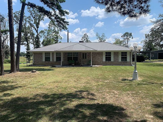 Photo of 201 County Road 35930, Powderly, TX