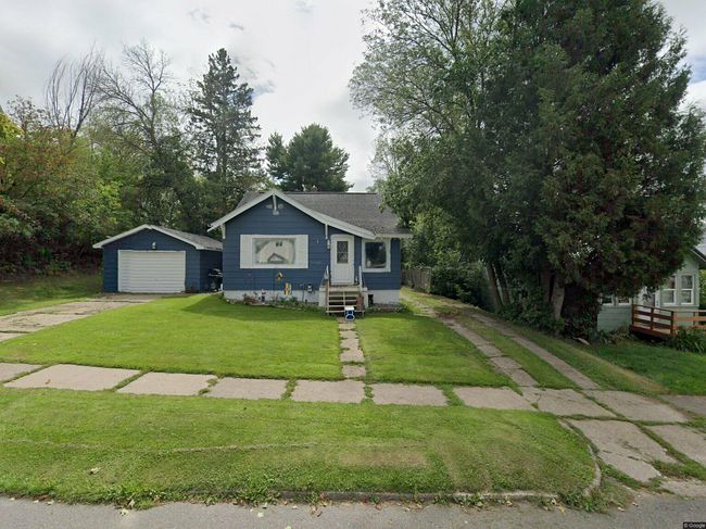 Photo of 210 Blossom St, Iron River, MI