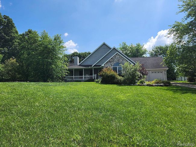 Photo of 80442 Woodridge Ln, Romeo, MI