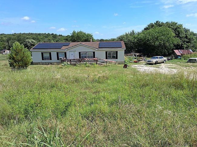 Photo of 406 Hilltop Meadows Ct, Springtown, TX