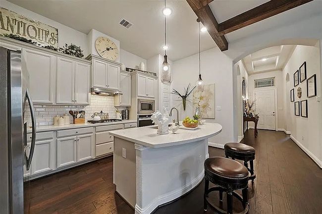 Photo of 311 Mallow Woods Pl, Willis, TX