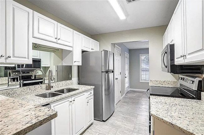 Photo of 703 Peachtree Forest Ave, Peachtree Corners, GA