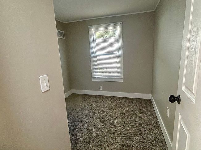 Photo of 1281 E Pontaluna Rd Lot 127, Norton Shores, MI