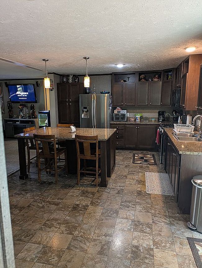 Photo of 13033 Nineteen Mile Rd #52M, Gowen, MI