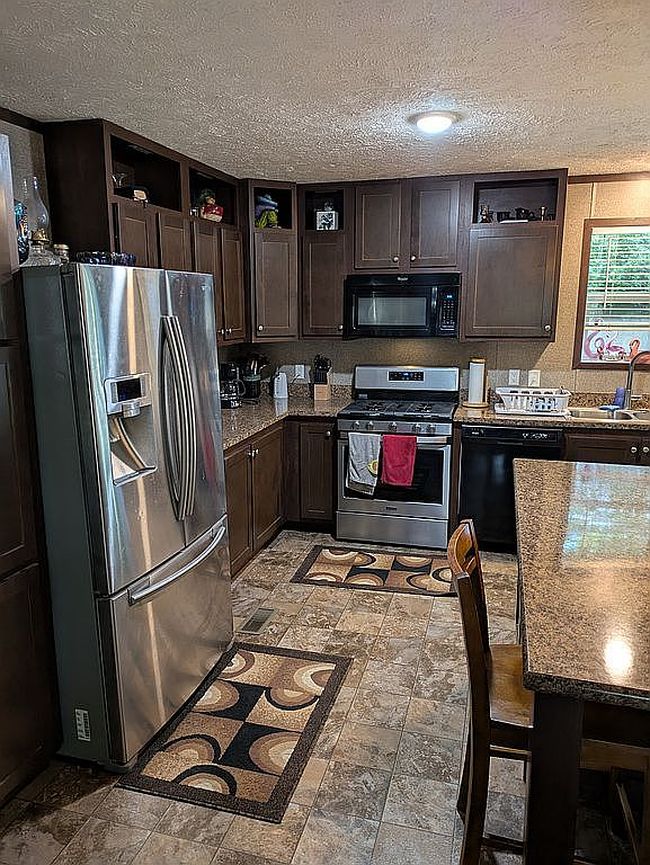 Photo of 13033 Nineteen Mile Rd #52M, Gowen, MI