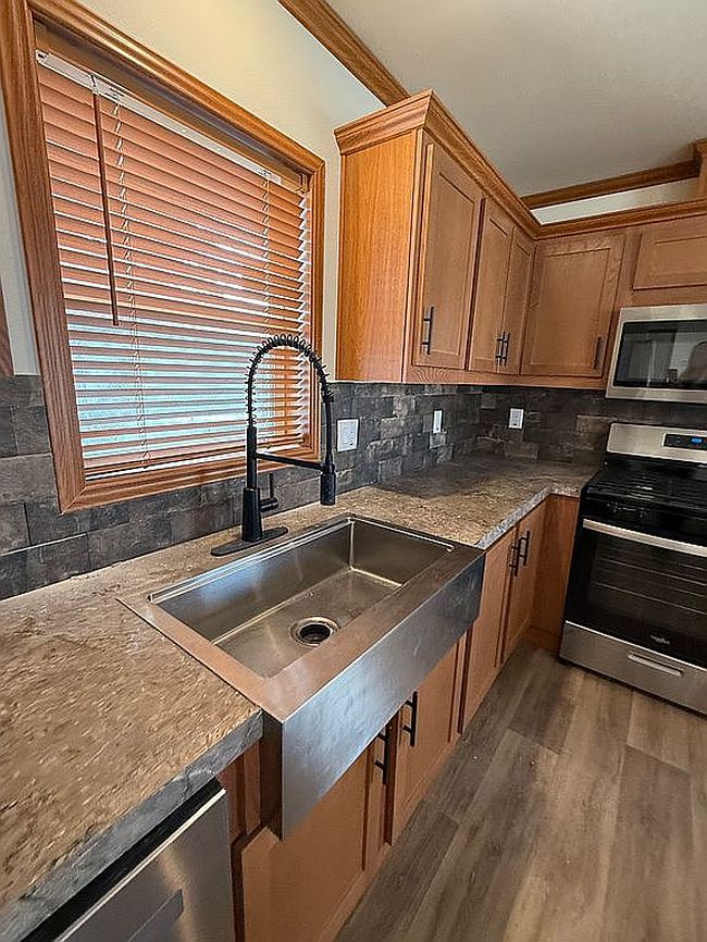 Additional photo 1 of property located at 534 E 37th Ave Lot 393