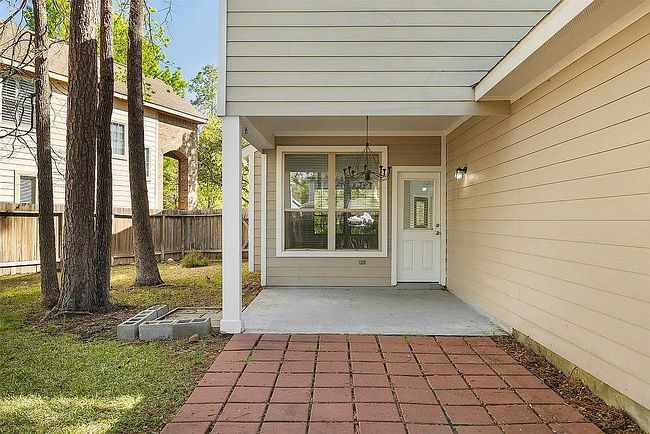Photo of 90 Panterra Way, Spring, TX