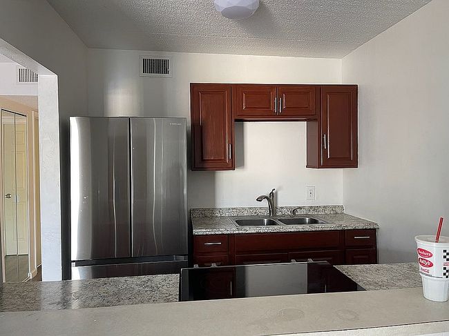 Additional photo 2 of property located at 411 N Halifax Ave Apt 207