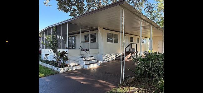 Photo of 15406 Lakeshore Villa Pl Unit 107, Tampa, FL