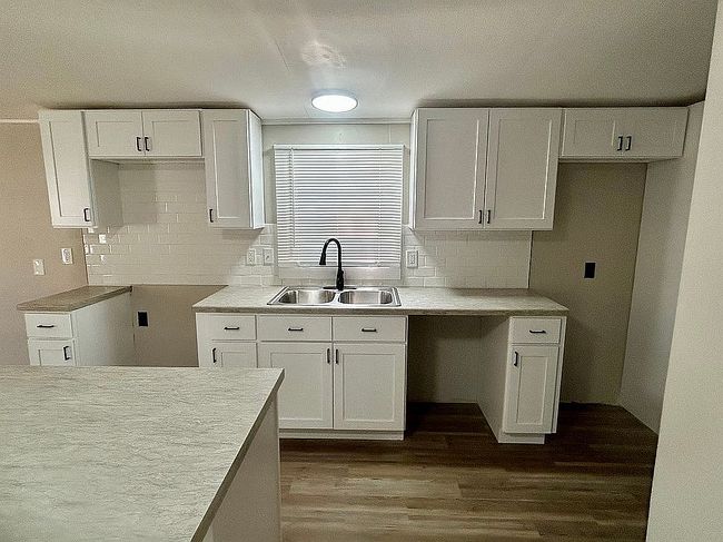 Photo of 1281 E Pontaluna Rd Lot 127, Norton Shores, MI