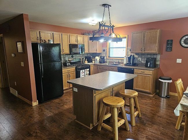 Photo of 102 Maid Marian Way, Roscommon, MI