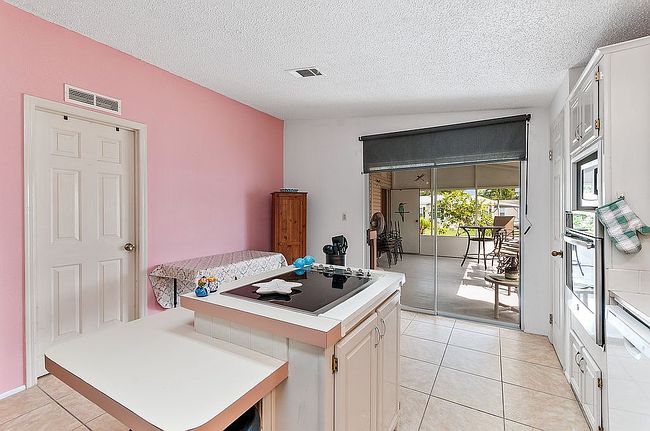 Photo of 213 Robelina Palm Ln, Naples, FL