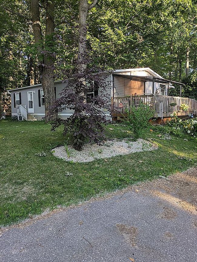Photo of 13033 Nineteen Mile Rd #52M, Gowen, MI
