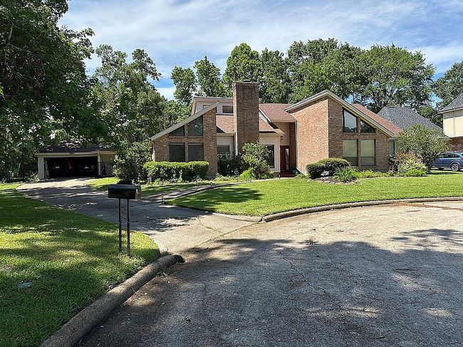 Photo of 5103 Windy Lake Dr, Kingwood, TX