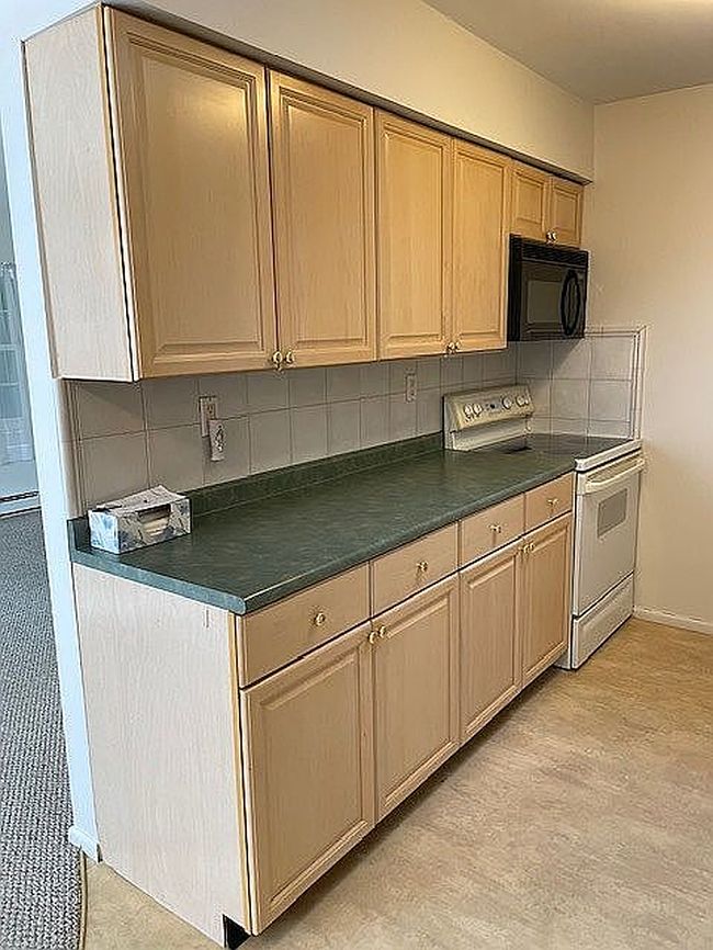 Photo of 120 Exmore Ct Unit D, Ridge, NY