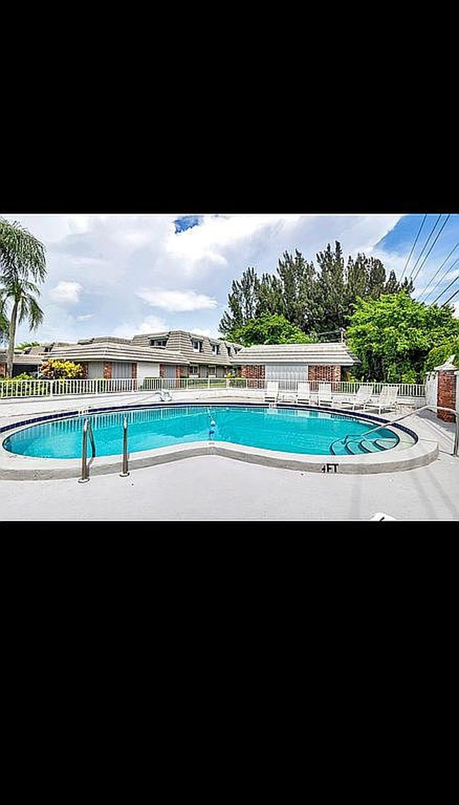 Photo of 419 Pine Tree Ct Apt 21, Atlantis, FL
