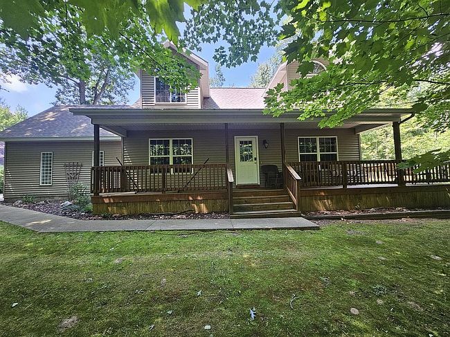 Photo of 102 Maid Marian Way, Roscommon, MI