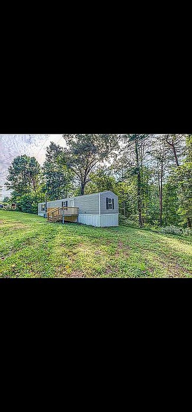 Photo of 247 Towee Falls Rd, Tellico Plains, TN