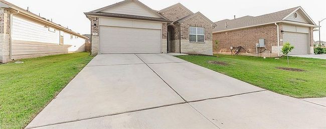Photo of 104 Rainmaker Cv, Bastrop, TX