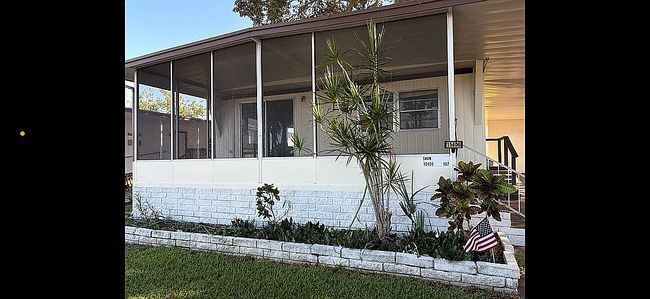 Photo of 15406 Lakeshore Villa Pl Unit 107, Tampa, FL