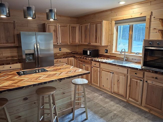Photo of 80 Tamarac Dr, Tupper Lake, NY