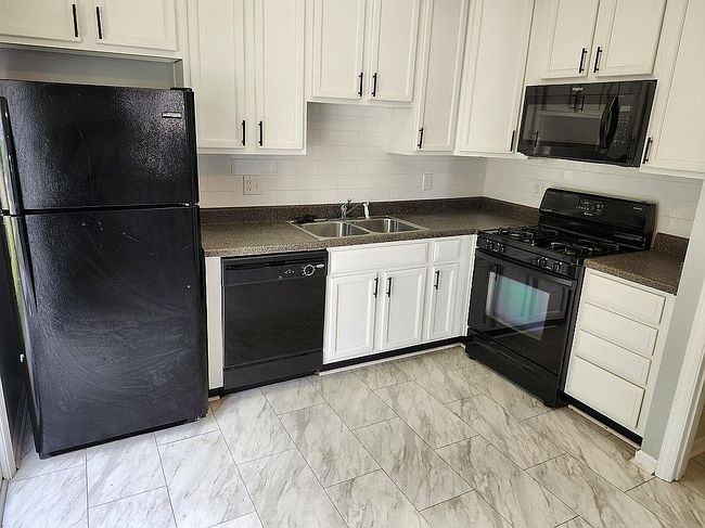 Additional photo 1 of property located at 8620 Neuse Club Ln Apt 111