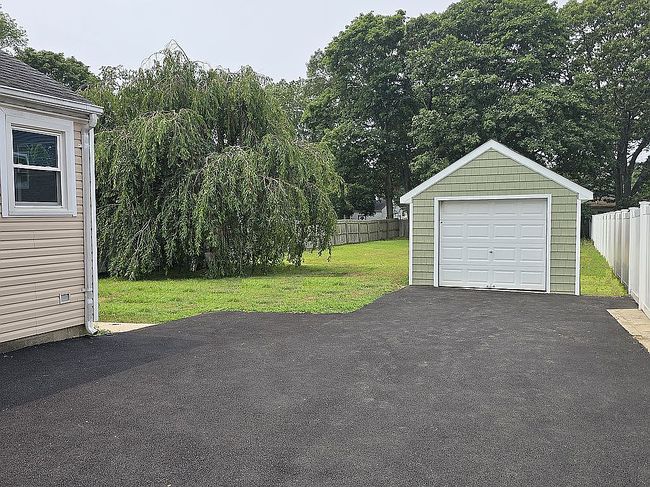 Photo of 84 Rollstone Ave, West Sayville, NY