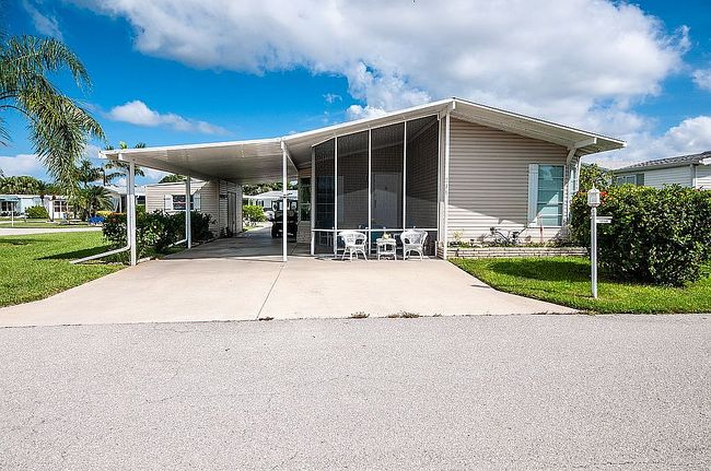 Photo of 213 Robelina Palm Ln, Naples, FL