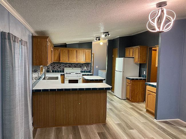 Photo of 604 Hidden River Dr #136, Adrian, MI